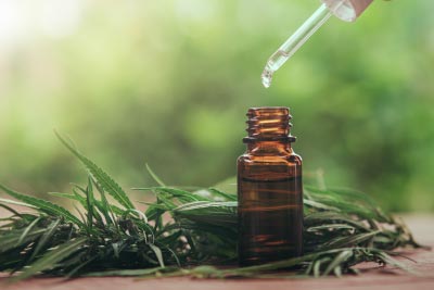 Measuring and extracting a safe dosage of CBD oil from a bottle